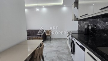 Меблированная квартира 1+1 в центре Махмутлара, 58 кв.м. - Ракурс 10