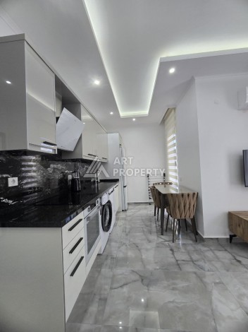 Меблированная квартира 1+1 в центре Махмутлара, 58 кв.м. - Ракурс 10