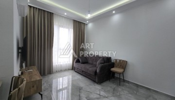 Меблированная квартира 1+1 в центре Махмутлара, 58 кв.м. - Ракурс 12