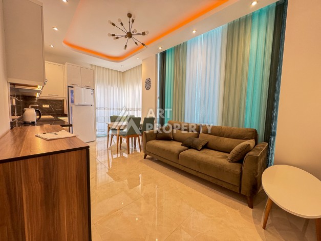 Меблированная квартира 1+1 в Махмутларе, 450 м до моря - Ракурс 13