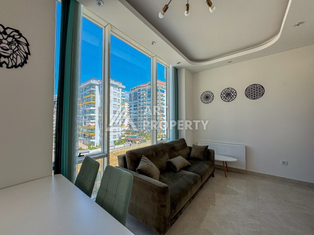 Меблированная квартира 1+1 в Махмутларе, 450 м до моря - Ракурс 23