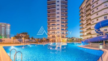 Просторная квартира 1+1 с видом на море в Махмутларе, 70 кв.м. - Ракурс 1