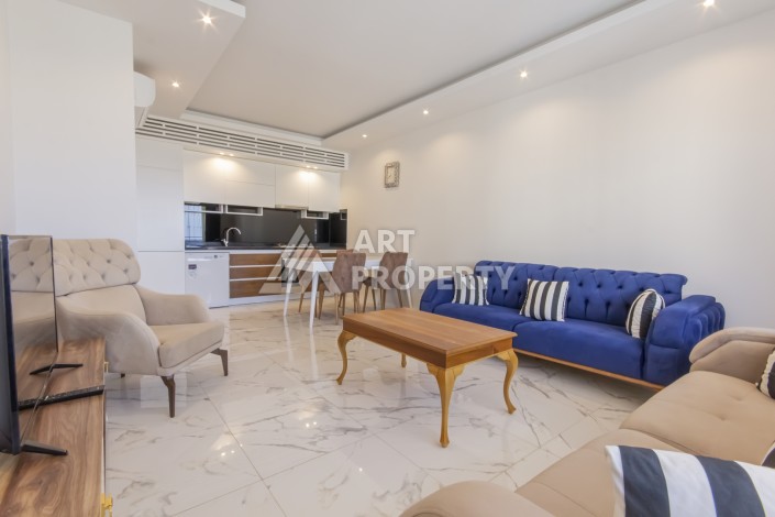 Просторная квартира 1+1 с видом на море в Махмутларе, 70 кв.м. - Ракурс 4