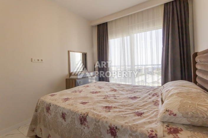 Просторная квартира 1+1 с видом на море в Махмутларе, 70 кв.м. - Ракурс 6