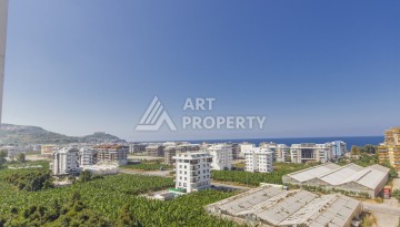 Просторная квартира 1+1 с видом на море в Махмутларе, 70 кв.м. - Ракурс 10