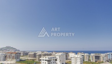 Просторная квартира 1+1 с видом на море в Махмутларе, 70 кв.м. - Ракурс 11