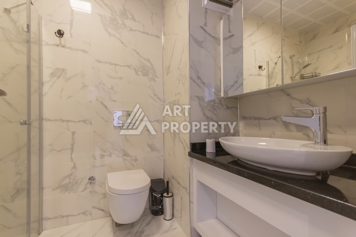 Просторная квартира 1+1 с видом на море в Махмутларе, 70 кв.м. - Ракурс 19