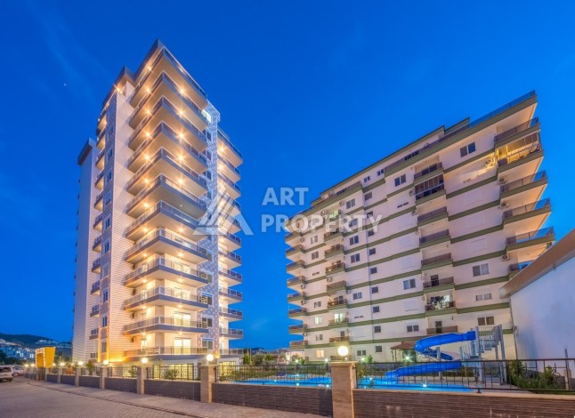 Просторная квартира 1+1 с видом на море в Махмутларе, 70 кв.м. - Ракурс 22