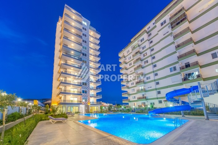 Просторная квартира 1+1 с видом на море в Махмутларе, 70 кв.м. - Ракурс 27