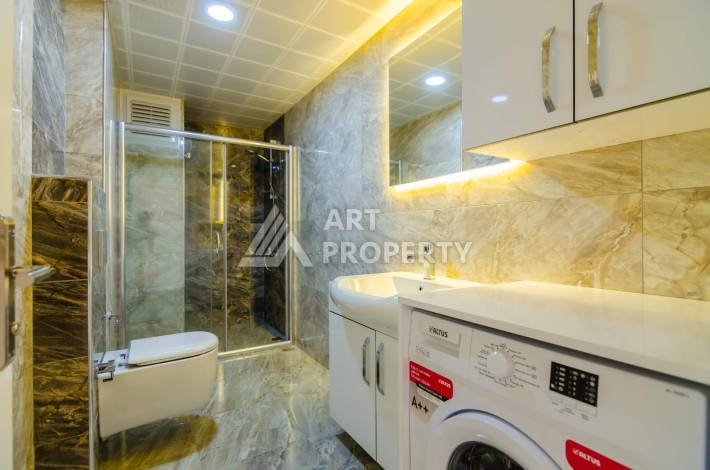 Просторная квартира 1+1 площадью 70 м² в уютном жилом комплексе у моря - Ракурс 9