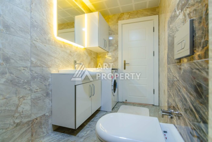 Просторная квартира 1+1 площадью 70 м² в уютном жилом комплексе у моря - Ракурс 10