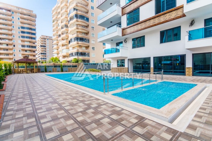 Просторная квартира 1+1 площадью 70 м² в уютном жилом комплексе у моря - Ракурс 32