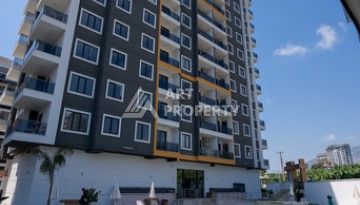 Квартиры 1+1 в люкс-резиденции, 650 м до моря в Махмутларе - Ракурс 2