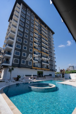 Квартиры 1+1 в люкс-резиденции, 650 м до моря в Махмутларе - Ракурс 1