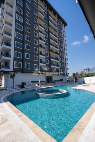 Квартиры 1+1 в люкс-резиденции, 650 м до моря в Махмутларе - Ракурс 3