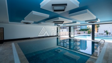 Квартиры 1+1 в люкс-резиденции, 650 м до моря в Махмутларе - Ракурс 6