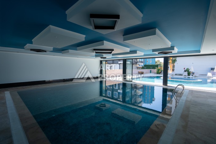 Квартиры 1+1 в люкс-резиденции, 650 м до моря в Махмутларе - Ракурс 6