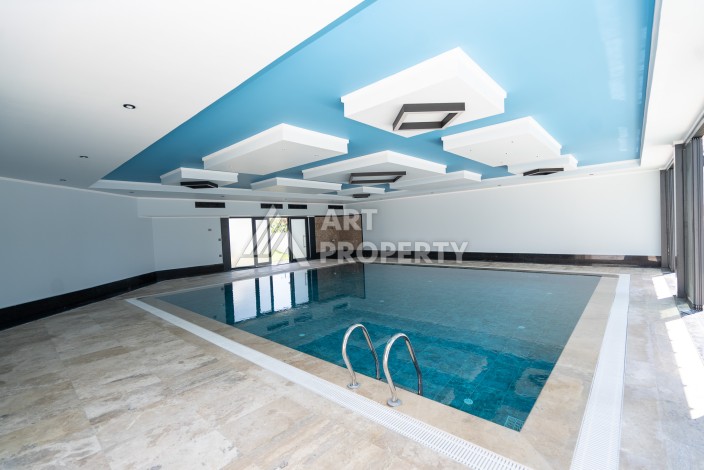 Квартиры 1+1 в люкс-резиденции, 650 м до моря в Махмутларе - Ракурс 7