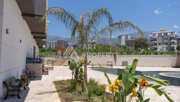 Квартиры 1+1 в люкс-резиденции, 650 м до моря в Махмутларе - Ракурс 15