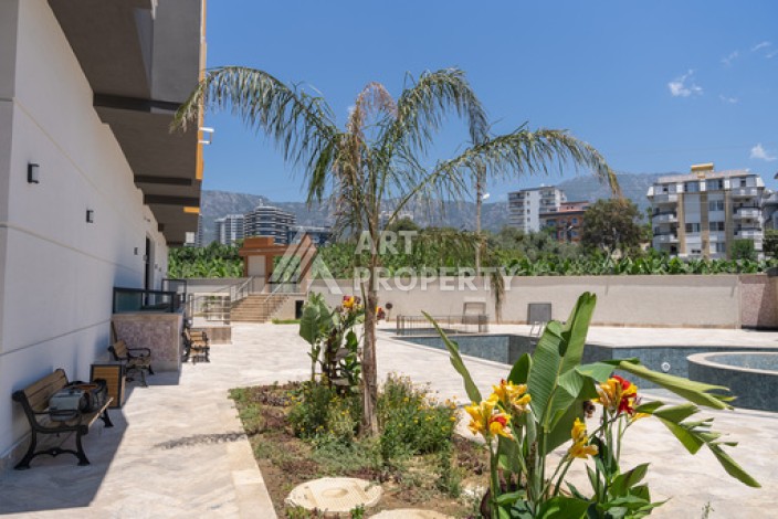 Квартиры 1+1 в люкс-резиденции, 650 м до моря в Махмутларе - Ракурс 14