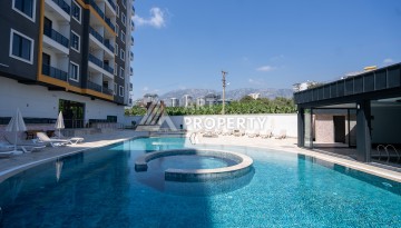 Квартиры 1+1 в люкс-резиденции, 650 м до моря в Махмутларе - Ракурс 18