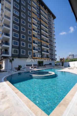 Квартиры 1+1 в люкс-резиденции, 650 м до моря в Махмутларе - Ракурс 18