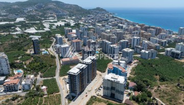 Квартиры 1+1 в люкс-резиденции, 650 м до моря в Махмутларе - Ракурс 21