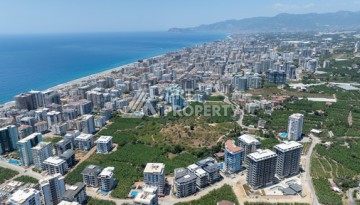 Квартиры 1+1 в люкс-резиденции, 650 м до моря в Махмутларе - Ракурс 28