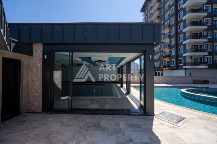 Квартиры 1+1 в люкс-резиденции, 650 м до моря в Махмутларе - Ракурс 32