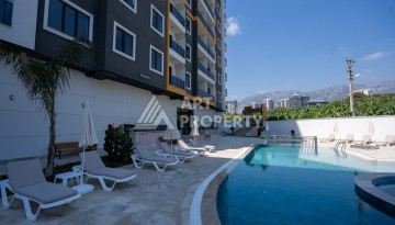 Квартиры 1+1 в люкс-резиденции, 650 м до моря в Махмутларе - Ракурс 44