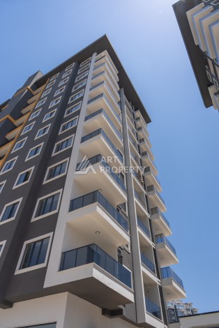 Квартиры 1+1 в люкс-резиденции, 650 м до моря в Махмутларе - Ракурс 49