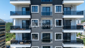 Квартиры 1+1 в люкс-резиденции, 650 м до моря в Махмутларе - Ракурс 52