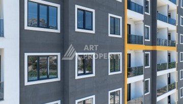 Квартиры 1+1 в люкс-резиденции, 650 м до моря в Махмутларе - Ракурс 53