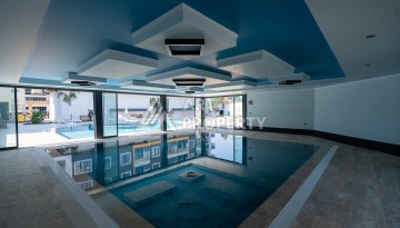 Квартиры 1+1 в люкс-резиденции, 650 м до моря в Махмутларе - Ракурс 56