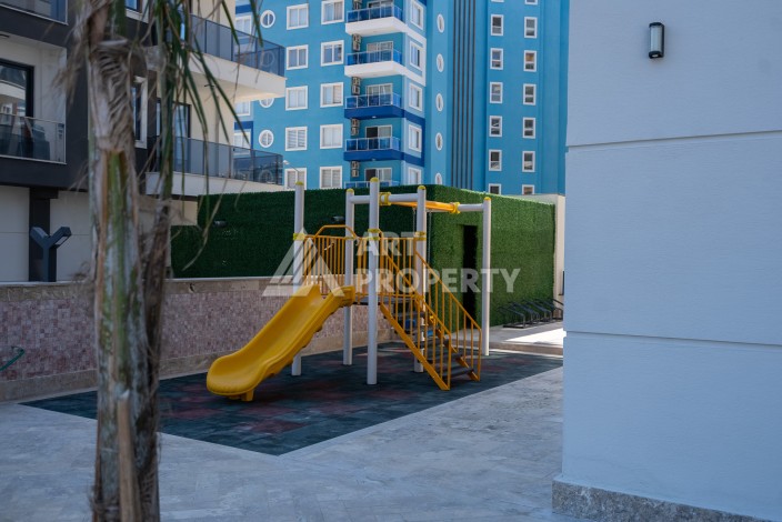 Квартиры 1+1 в люкс-резиденции, 650 м до моря в Махмутларе - Ракурс 74