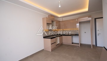 Квартиры 1+1 в люкс-резиденции, 650 м до моря в Махмутларе - Ракурс 96