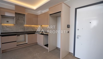 Квартиры 1+1 в люкс-резиденции, 650 м до моря в Махмутларе - Ракурс 100