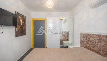 Стильная квартира 1+1 в Махмутларе в комплексе индивидуальным архитектурным дизайном в 250 метрах от моря - Ракурс 4