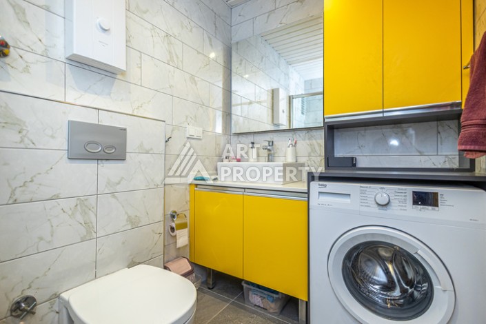 Стильная квартира 1+1 в Махмутларе в комплексе индивидуальным архитектурным дизайном в 250 метрах от моря - Ракурс 5