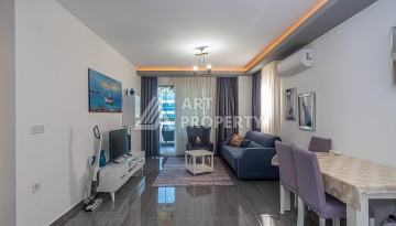 Стильная квартира 1+1 в Махмутларе в комплексе индивидуальным архитектурным дизайном в 250 метрах от моря - Ракурс 10