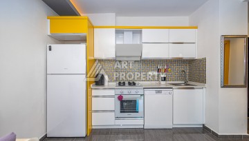 Стильная квартира 1+1 в Махмутларе в комплексе индивидуальным архитектурным дизайном в 250 метрах от моря - Ракурс 11