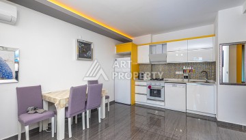 Стильная квартира 1+1 в Махмутларе в комплексе индивидуальным архитектурным дизайном в 250 метрах от моря - Ракурс 12