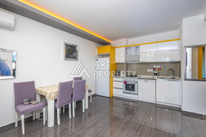 Стильная квартира 1+1 в Махмутларе в комплексе индивидуальным архитектурным дизайном в 250 метрах от моря - Ракурс 11