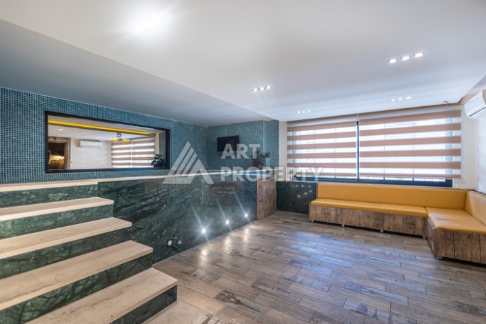 Стильная квартира 1+1 в Махмутларе в комплексе индивидуальным архитектурным дизайном в 250 метрах от моря - Ракурс 12