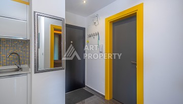 Стильная квартира 1+1 в Махмутларе в комплексе индивидуальным архитектурным дизайном в 250 метрах от моря - Ракурс 14