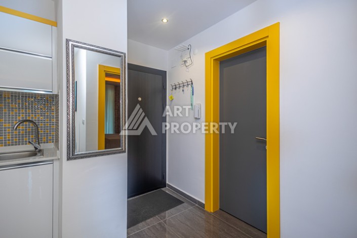 Стильная квартира 1+1 в Махмутларе в комплексе индивидуальным архитектурным дизайном в 250 метрах от моря - Ракурс 13