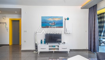 Стильная квартира 1+1 в Махмутларе в комплексе индивидуальным архитектурным дизайном в 250 метрах от моря - Ракурс 15