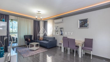 Стильная квартира 1+1 в Махмутларе в комплексе индивидуальным архитектурным дизайном в 250 метрах от моря - Ракурс 17