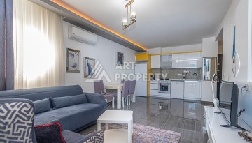 Стильная квартира 1+1 в Махмутларе в комплексе индивидуальным архитектурным дизайном в 250 метрах от моря - Ракурс 18