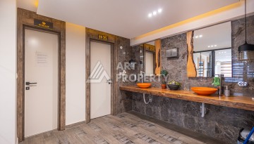 Стильная квартира 1+1 в Махмутларе в комплексе индивидуальным архитектурным дизайном в 250 метрах от моря - Ракурс 19